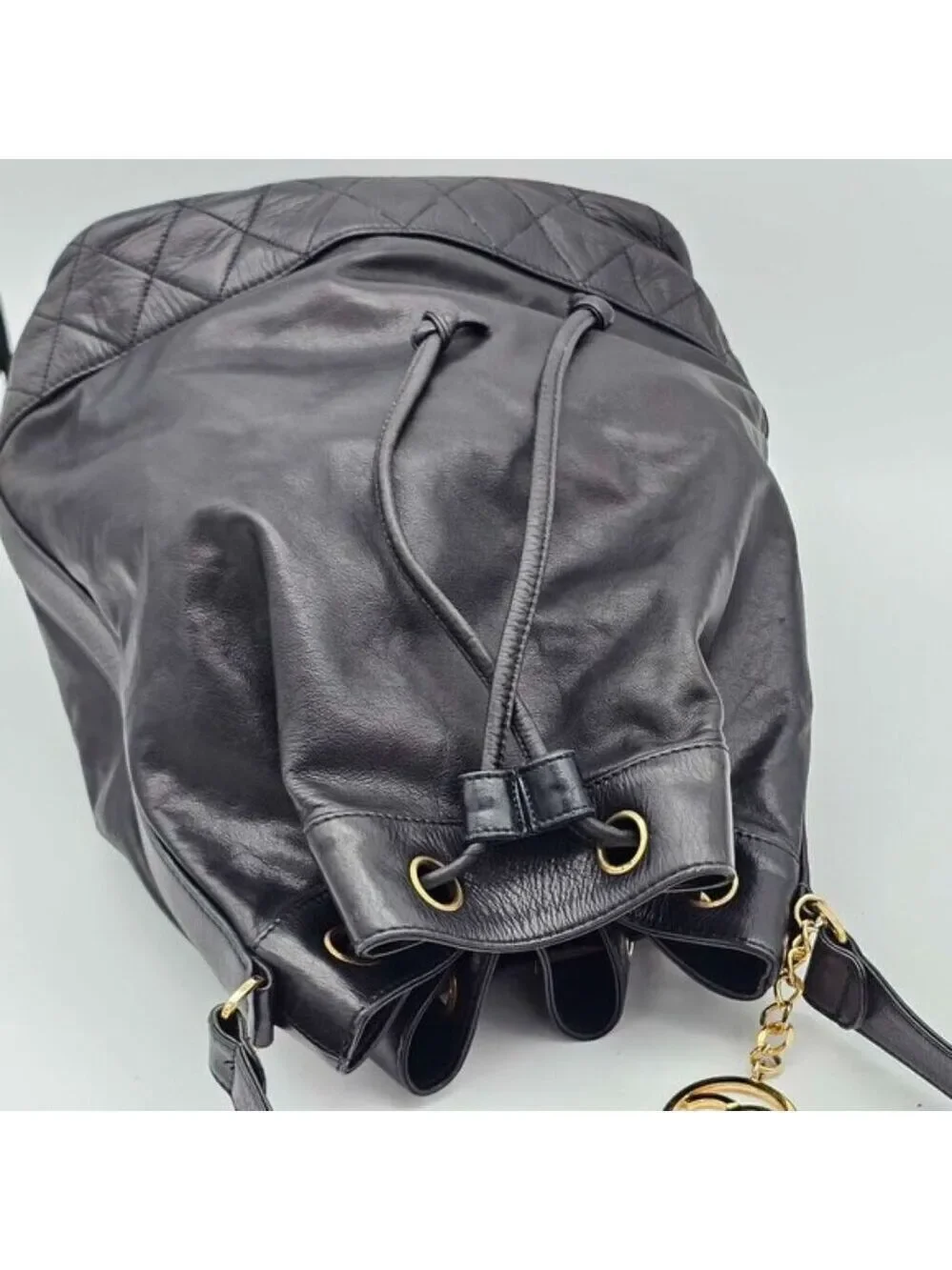 Authentic Chanel Drawstring Bucket Bag Black Leather Gold Chain CC Logo